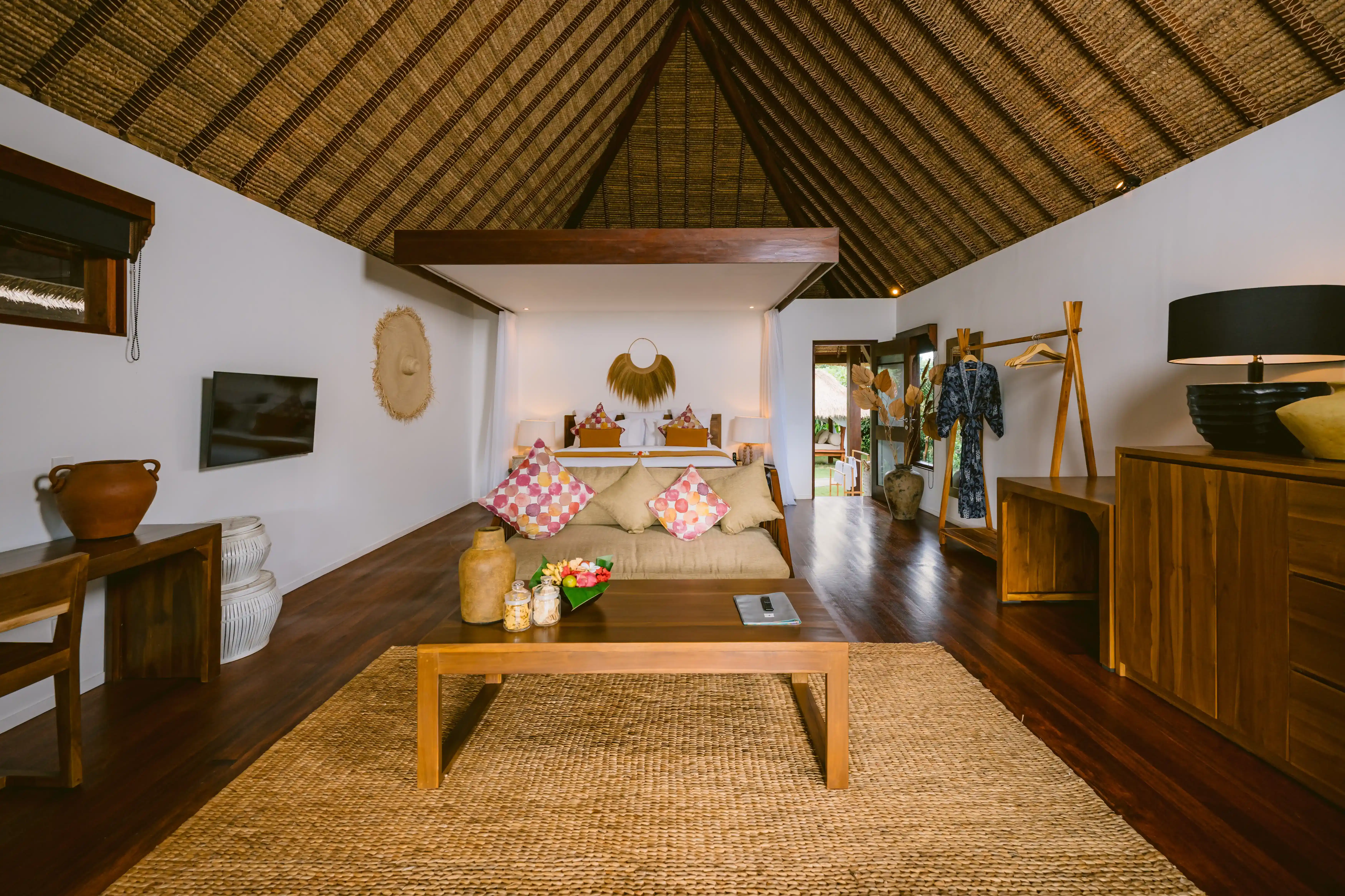 Spacious open living room in the 2-bedroom family villa at Pondok Santi Estate, with comfortable sofas and elegant furnishings.