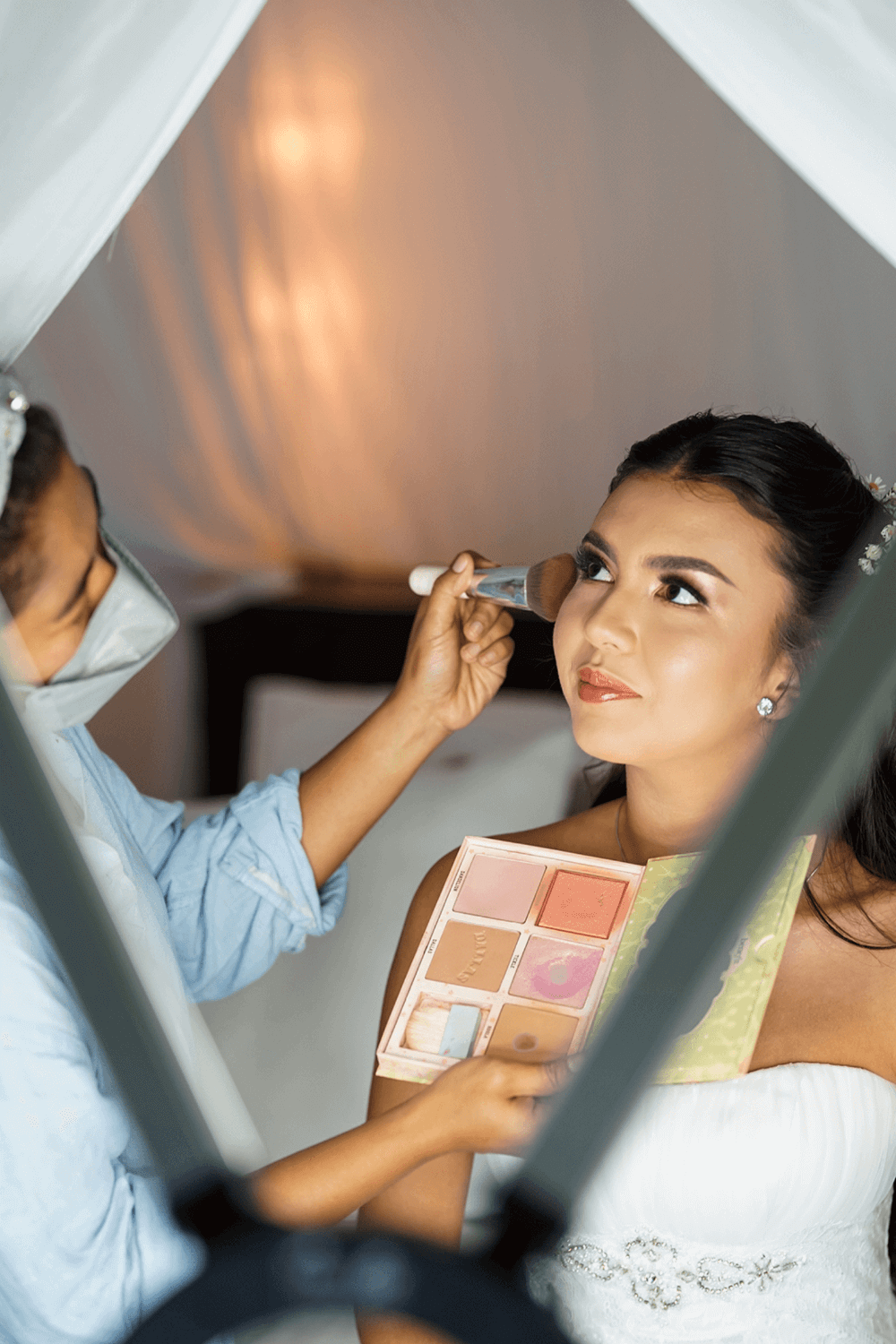 A bride having makeup applied for her wedding at Pondok Santi Estate, Gili Trawangan.