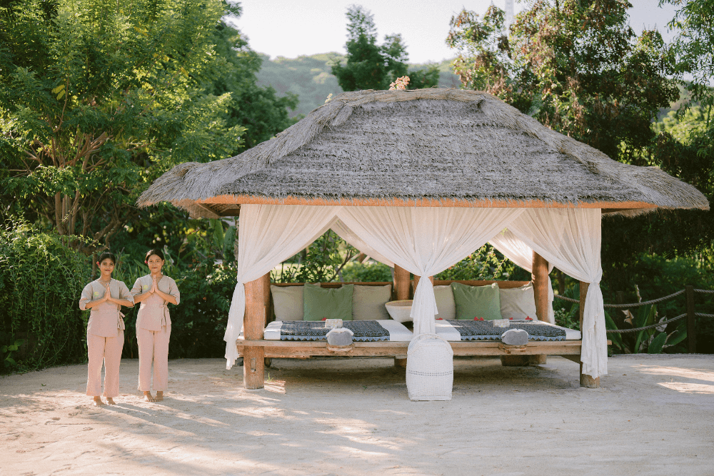Two massage therapists at a beautiful massage location at Pondok Santi Estate, Gili Trawangan.