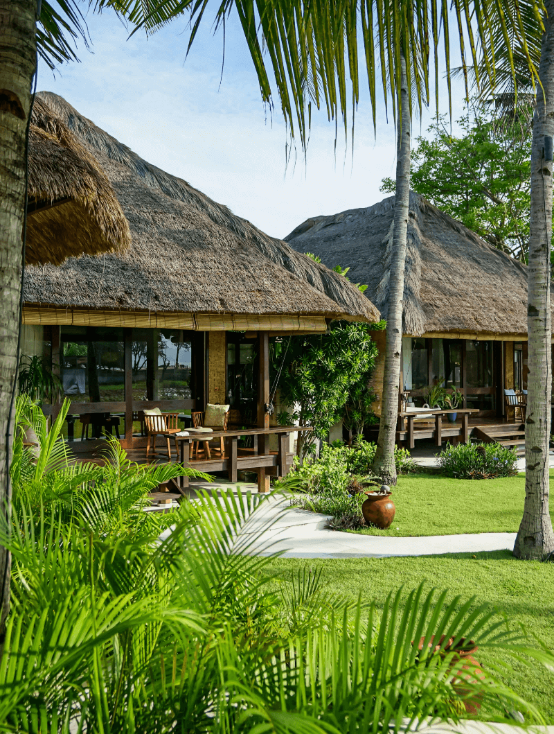 Two ocean-view villas at Pondok Santi Estate, overlooking turquoise waters and lush greenery, Gili Trawangan.